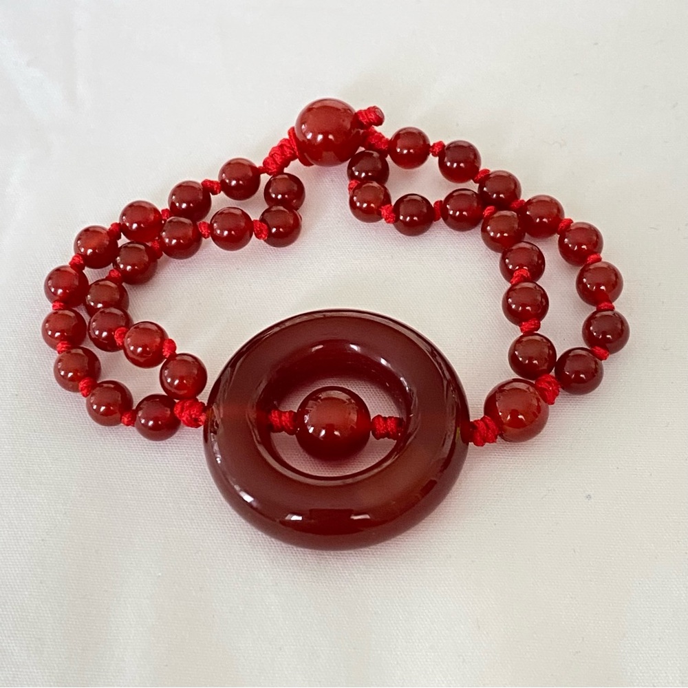 Carnelian beaded hand knotted 7” bracelet.